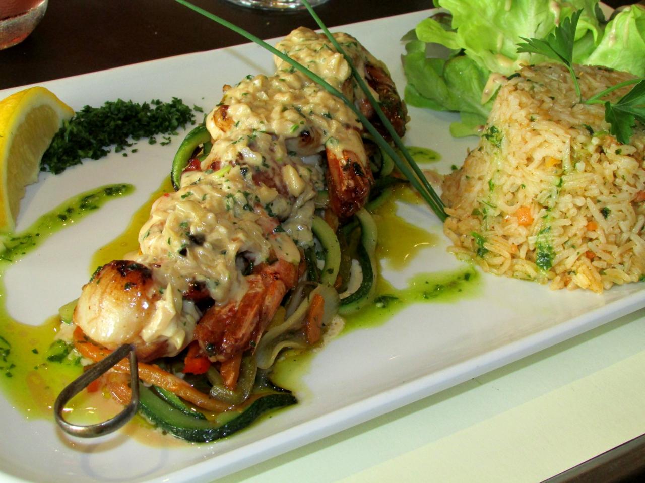 Seafood platter, Skewer of scallops and prawns, rice